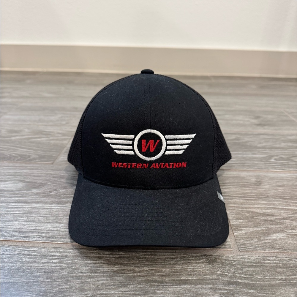 Travis Mathew Black Cap with White and Red Western Aviation Logo